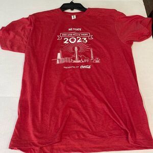 E275/276 (98A) NC State Coca-Cola 2023 Tee NWOT Sz. L or S Red & White Week 2023
